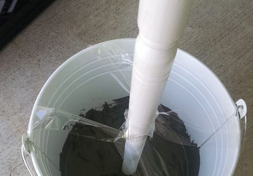 See how to stick a table leg from Lowe’s into a bucket to make your neighbors smile whenever they pass your house!
